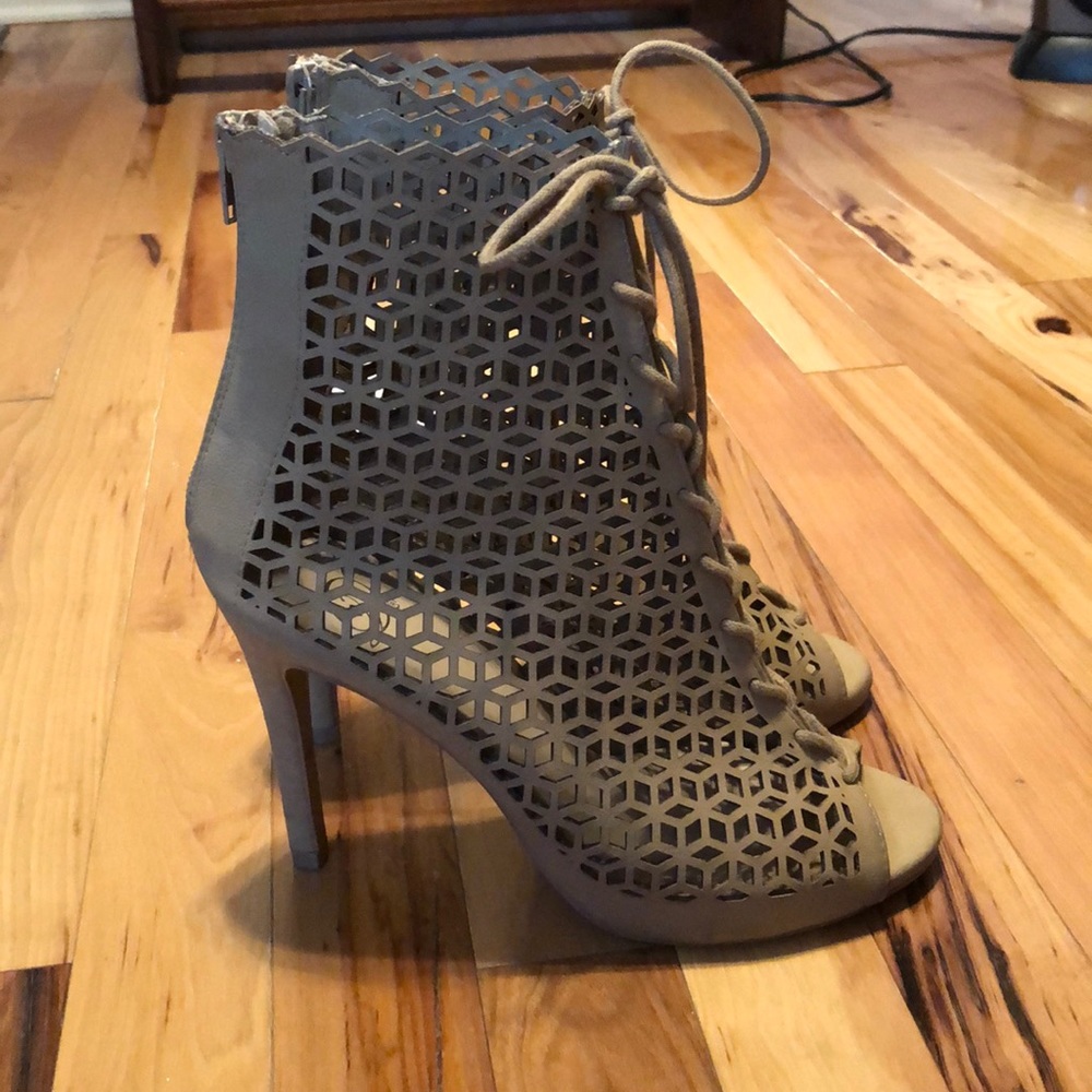 Cream colored lace up open toe boots